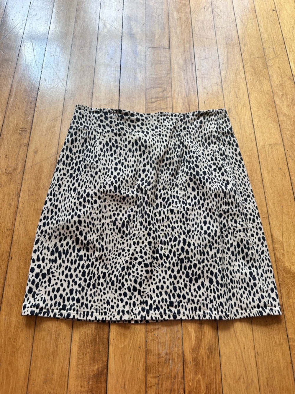 Brandy Melville Black and Cream Leopard Print Mini Skirt